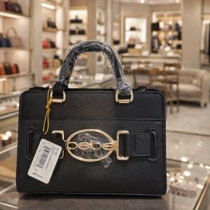 Elegant Black Bebe Satchel with Gold Accent